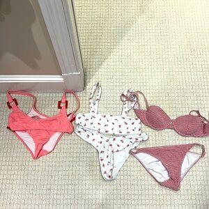 3 bikinis size small or medium in all pieces. Onia and Solid and Stripe